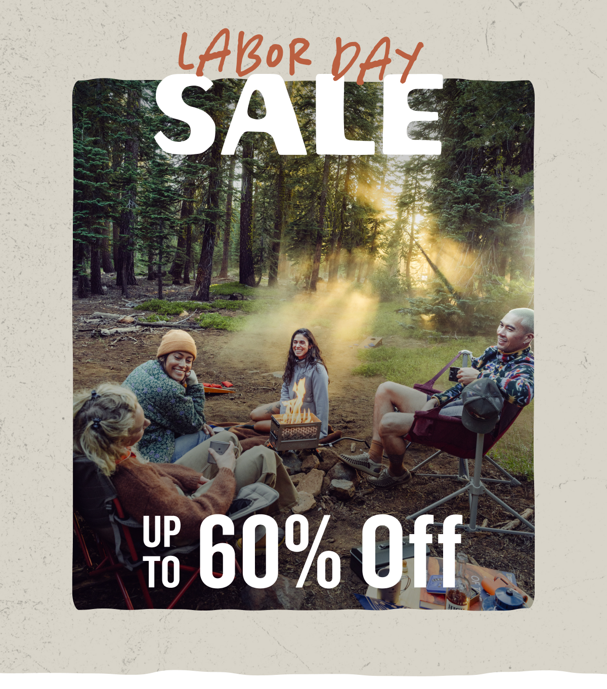 Labor Day Sale Up To 60% Off. people sitting around a campfire