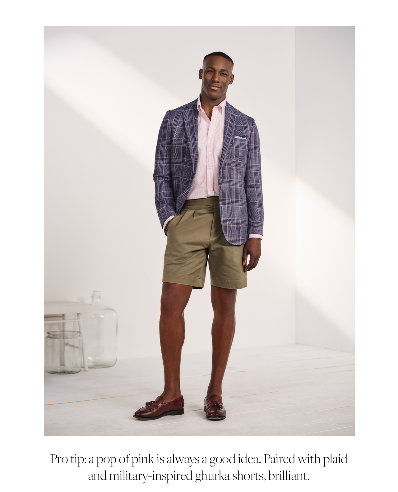 Pro tip: a pop of pink is always a good idea. Paired with plaid and military-inspired ghurka shorts, brilliant