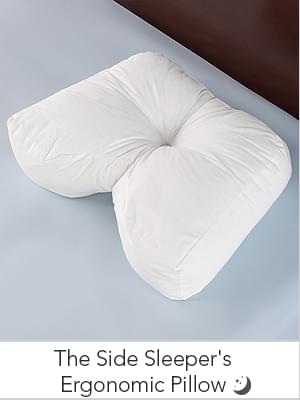 The Ergonomic Side Sleeper Pillow - Hammacher Schlemmer