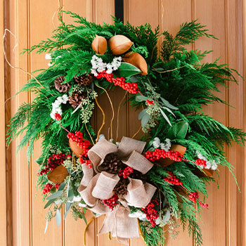 SHOP FESTIVE<br>WREATHS AND TREES